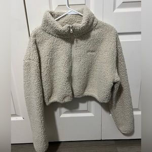 SKIMS TEDDY ZIP UP CROP JACKET | COLOR: BONE 
SIZE:  M